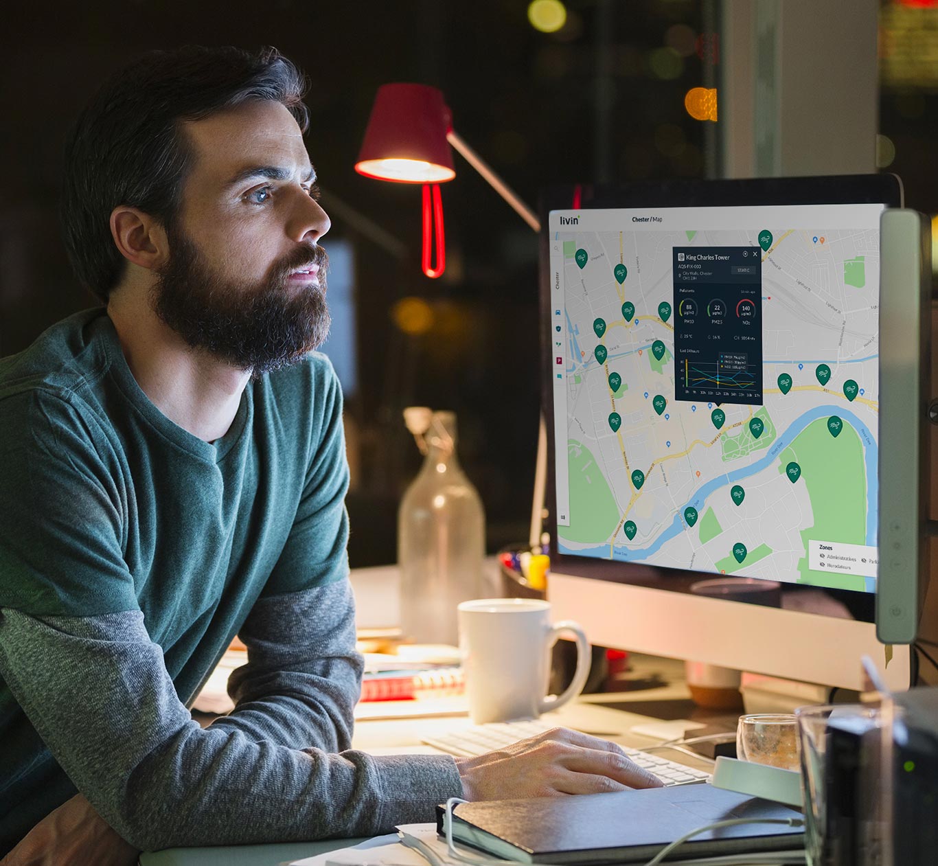 Man looking at a screen monitoring